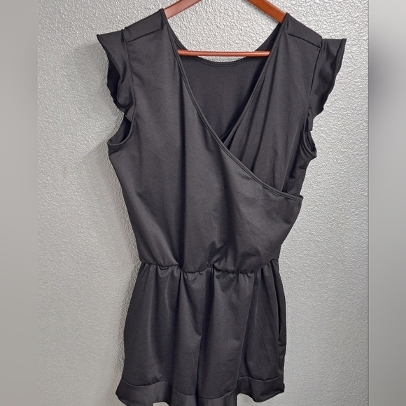 Black Romper With A Ruffled Short/Swimsuit - Picture 1 of 9